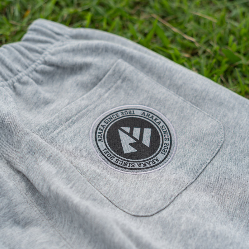 ARAKA LAYERED PATCH SWEATPANTS
