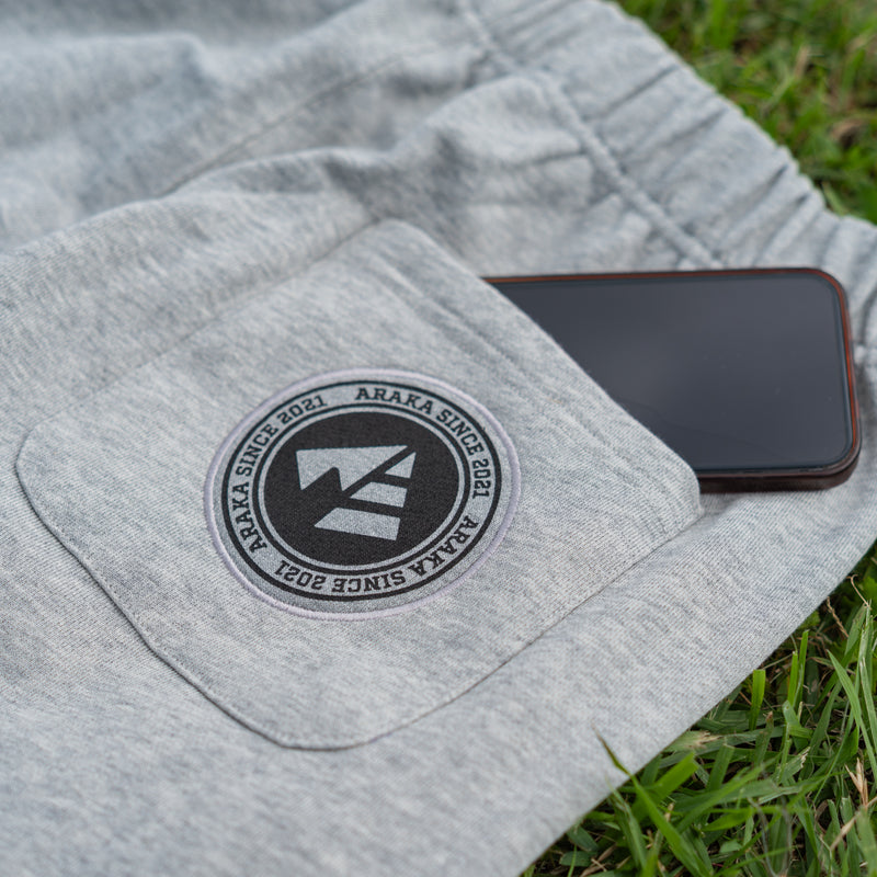 ARAKA LAYERED PATCH SWEATPANTS