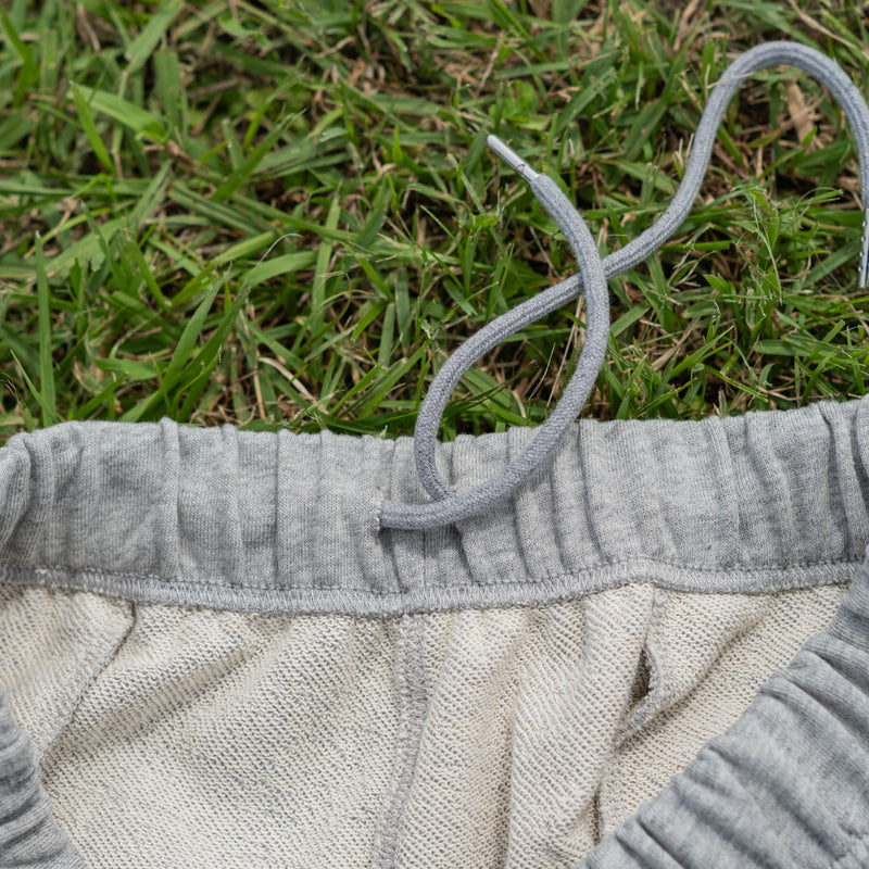 ARAKA LAYERED PATCH SWEATPANTS