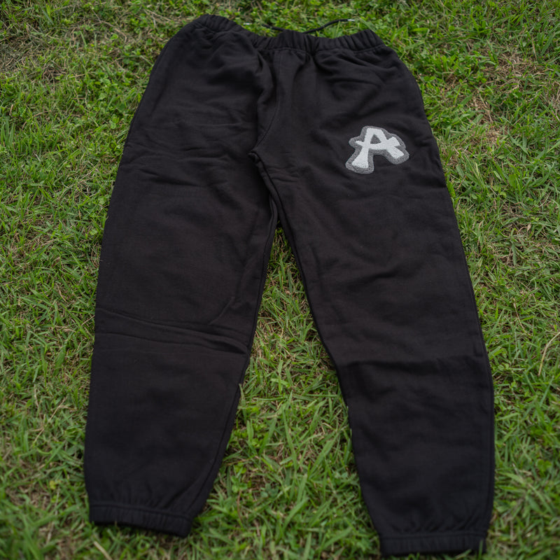 ARAKA LAYERED PATCH SWEATPANTS