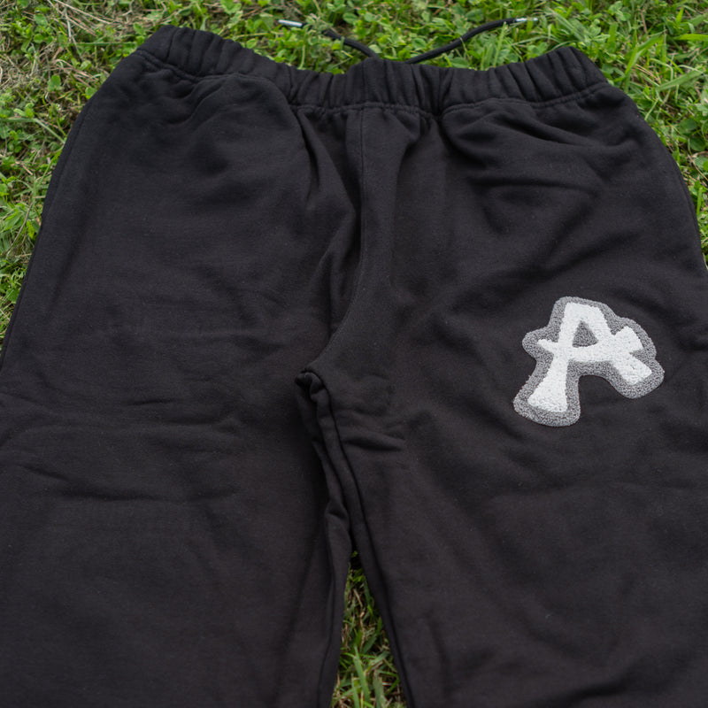 ARAKA LAYERED PATCH SWEATPANTS