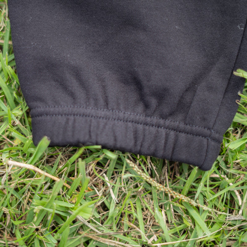 ARAKA LAYERED PATCH SWEATPANTS