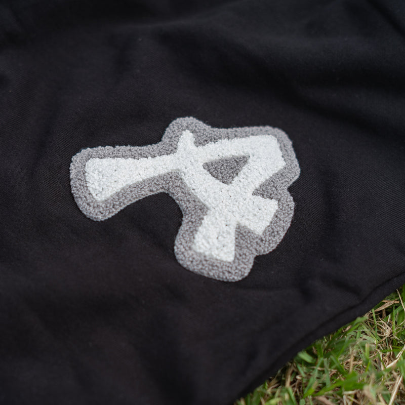 ARAKA LAYERED PATCH SWEATPANTS