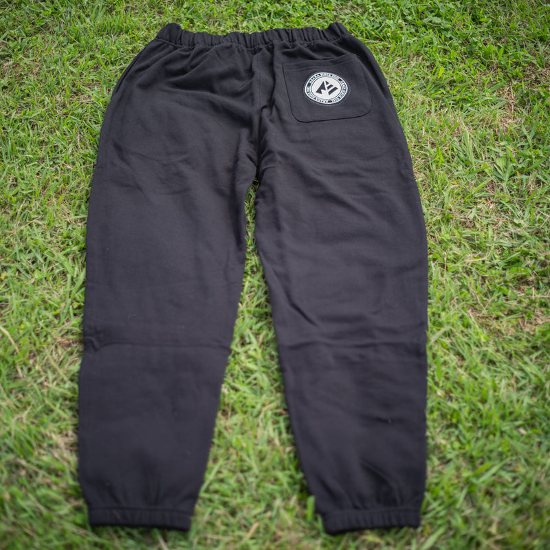 ARAKA LAYERED PATCH SWEATPANTS