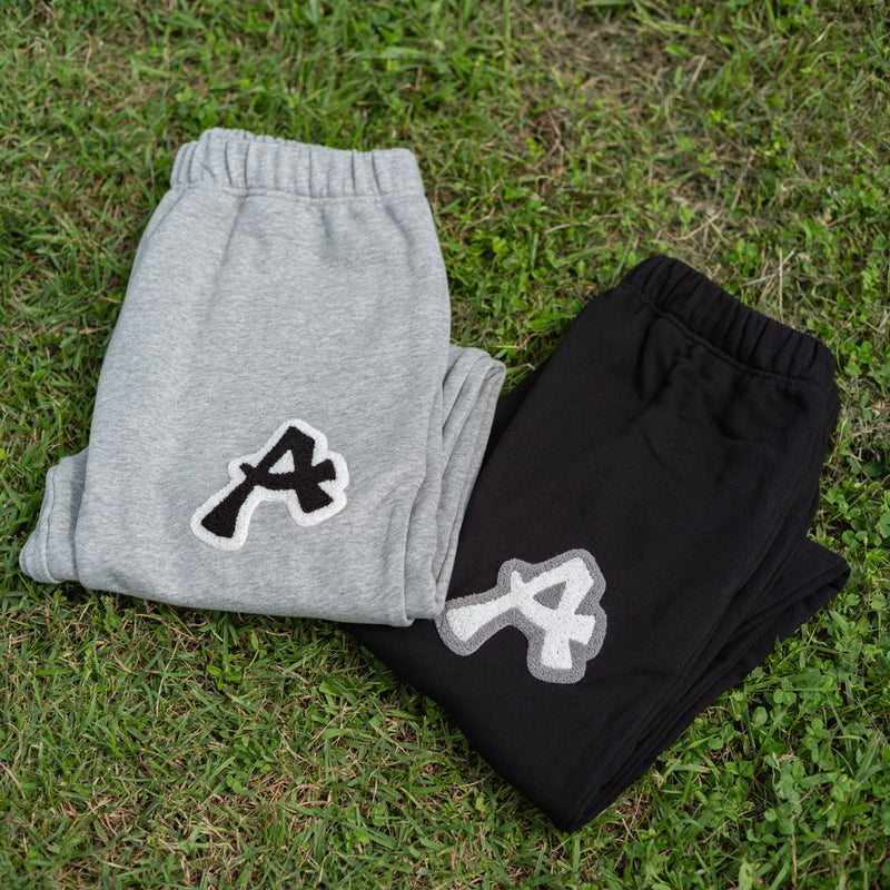 ARAKA LAYERED PATCH SWEATPANTS