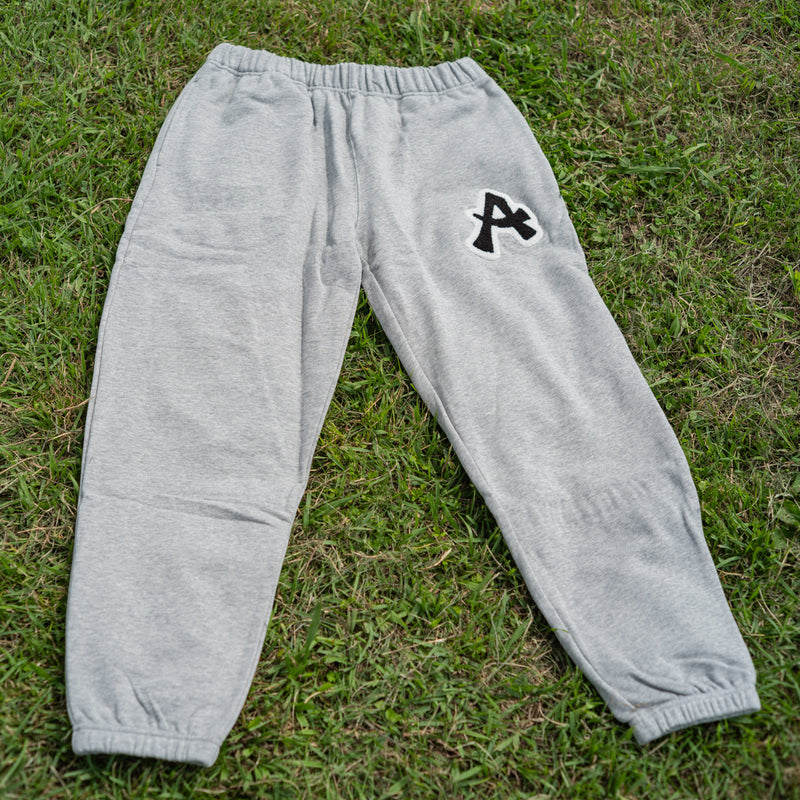 ARAKA LAYERED PATCH SWEATPANTS