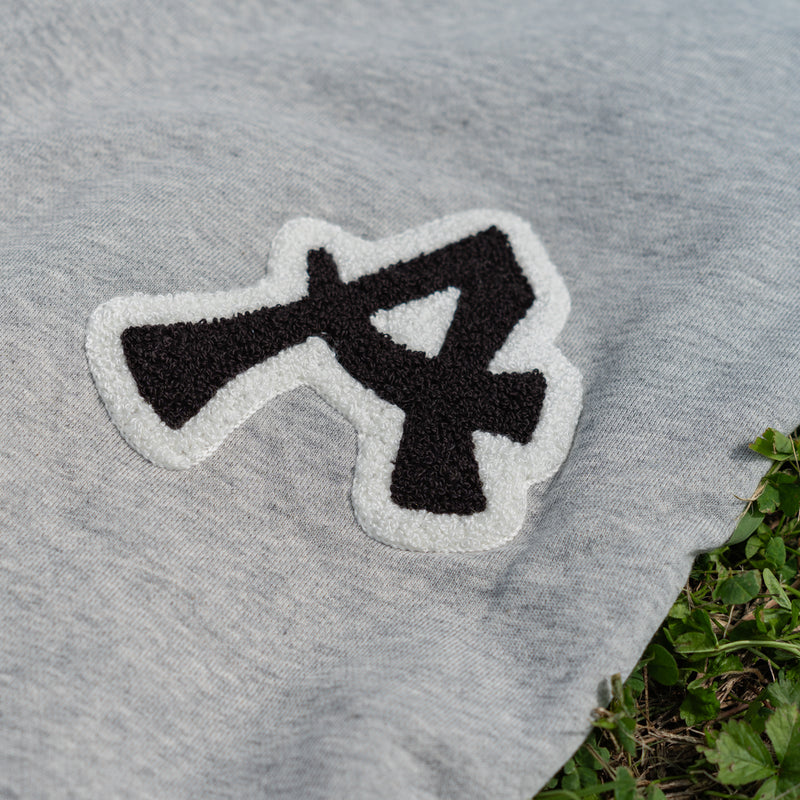 ARAKA LAYERED PATCH SWEATPANTS