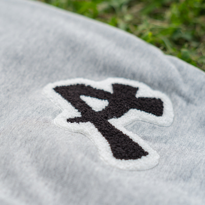 ARAKA LAYERED PATCH SWEATPANTS
