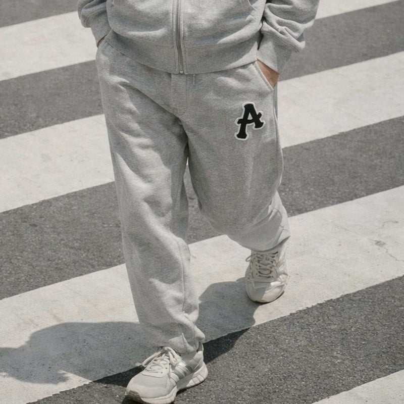 ARAKA LAYERED PATCH SWEATPANTS