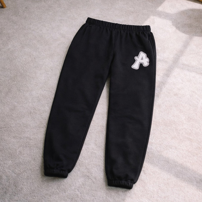 ARAKA LAYERED PATCH SWEATPANTS