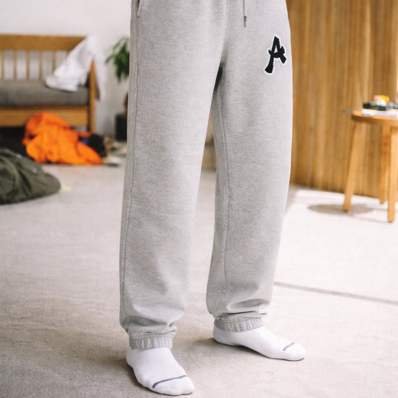 ARAKA LAYERED PATCH SWEATPANTS